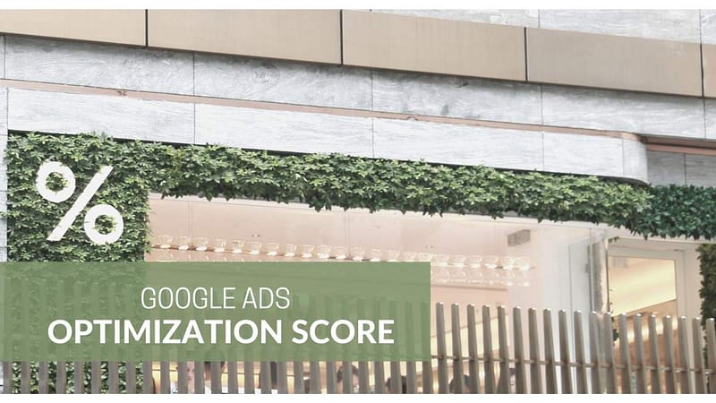 % Sign on vines growing on a house. Text Google Ads Optimization Score